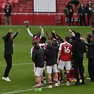 Arsenal Celebrate Victory Over Brighton & Hove Albion in Premier League Showdown
