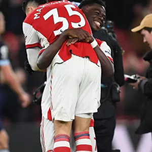 Arsenal Celebrate Victory: Martinelli and Saka Rejoice After Arsenal v West Ham United (2021-22)