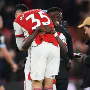 Arsenal Celebrate Victory: Martinelli and Saka Rejoice After Arsenal v West Ham United (2021-22) Arsenal Celebrate Victory: Martinelli and Saka Rejoice After Arsenal v West Ham United (2021-22)