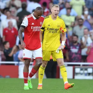 Arsenal Celebrate Win Against Fulham: Ramsdale and Magalhaes Embrace Arsenal Celebrate Win Against Fulham: Ramsdale and Magalhaes Embrace