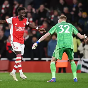 Arsenal Celebrate Win Against Wolverhampton Wanderers: Bukayo Saka and Aaron Ramsdale