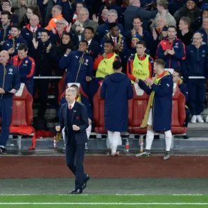 Arsenal Celebrates First Goal Against Manchester City (2015-16): Arsene Wenger and Team Rejoice on the Emirates Stadium Bench Arsenal Celebrates First Goal Against Manchester City (2015-16): Arsene Wenger and Team Rejoice on the Emirates Stadium Bench