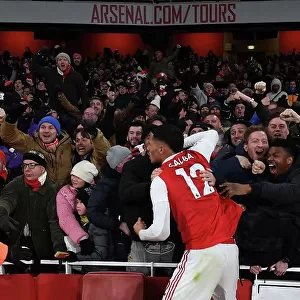Arsenal Celebrates Third Goal Against Manchester United: Saliba's Emotional Moment with Fans (2022-23)