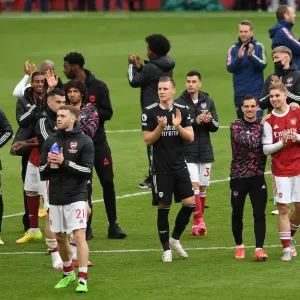Arsenal Clinches Premier League Title: Bernd Leno Celebrates with Fans after Victory over Brighton Arsenal Clinches Premier League Title: Bernd Leno Celebrates with Fans after Victory over Brighton