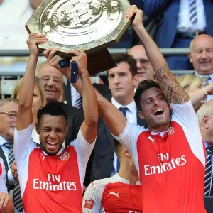 Arsenal: Coquelin and Giroud Celebrate Community Shield Victory Arsenal: Coquelin and Giroud Celebrate Community Shield Victory
