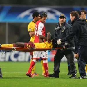 Arsenal defender Emmanuel Eboue is carried off after an injury to his ankle Arsenal defender Emmanuel Eboue is carried off after an injury to his ankle