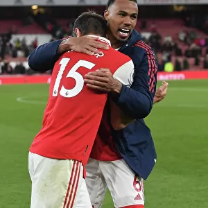 Arsenal Defenders Gabriel and Kiwior Celebrate Victory Over Chelsea in Premier League Showdown (2022-23)