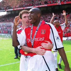 Arsenal defenders Martin Keown and Sol Campbell celebrate after the match Arsenal defenders Martin Keown and Sol Campbell celebrate after the match