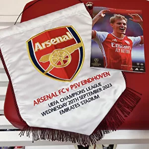 Arsenal Dressing Room: A Closer Look at the Match Pennant before Arsenal vs PSV Eindhoven, UEFA Champions League 2023/24