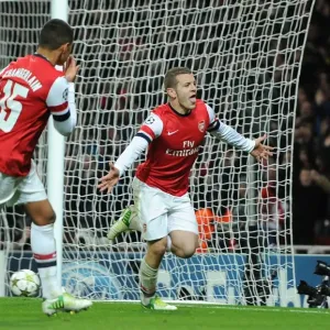 Arsenal Duo: Wilshere and Oxlade-Chamberlain Celebrate First Goal in Champions League Victory