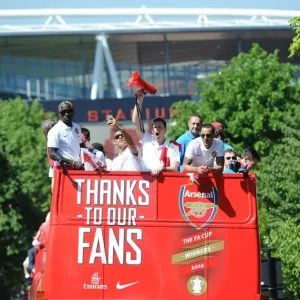 Arsenal FA Cup Victory: Celebrating with the Trophy in London, 2014 Arsenal FA Cup Victory: Celebrating with the Trophy in London, 2014