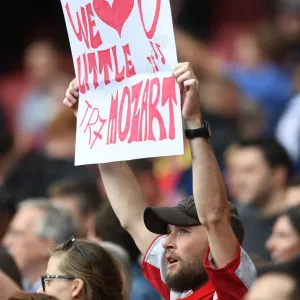 Arsenal Fan Cheers on Arsenal Legends vs Real Madrid Legends at Emirates Stadium