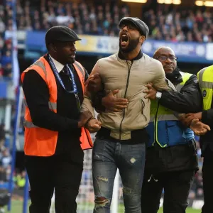 Arsenal Fan Removed from Chelsea vs. Arsenal Match, Premier League 2017-18 Arsenal Fan Removed from Chelsea vs. Arsenal Match, Premier League 2017-18