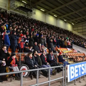 Arsenal Fans at Blackpool's Bloomfield Road during FA Cup Third Round Match