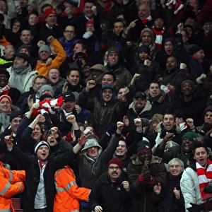 Arsenal fans celebrate the 3rd goal. Arsenal 4: 2 Bolton Wanderers. Barclays Premier League