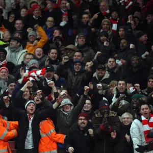 Arsenal fans celebrate the 3rd goal. Arsenal 4: 2 Bolton Wanderers. Barclays Premier League Arsenal fans celebrate the 3rd goal. Arsenal 4: 2 Bolton Wanderers. Barclays Premier League