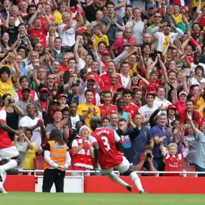 Arsenal fans celebrate Bacary Sagnas 2nd goal Print Arsenal fans celebrate Bacary Sagnas 2nd goal Print