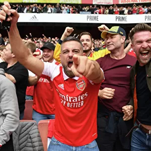 Arsenal Fans Celebrate Derby Victory: Arsenal FC vs. Tottenham Hotspur, Premier League 2022-23