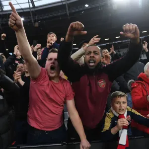 Arsenal Fans Celebrate Dramatic Win Against West Ham United in Premier League Showdown