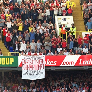 Arsenal Fans celebrate at the end of the match. Tottenham Hotsour v Arsenal