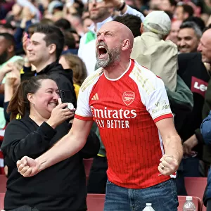 Arsenal Fans Celebrate Second Goal Against Tottenham in 2023-24 Premier League Match
