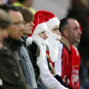 Arsenal fans dressed as Father Christmas Arsenal fans dressed as Father Christmas