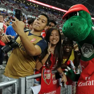 Arsenal Fans and Gunnersaurus Unite Before Arsenal vs. Singapore XI Match