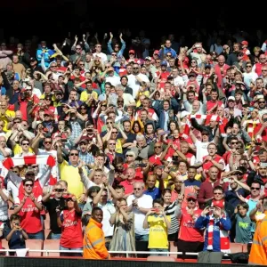 Arsenal fans on during the lap of honour. Arsenal 1: 0 West Bromwich Albion. Barclays Premier League Arsenal fans on during the lap of honour. Arsenal 1: 0 West Bromwich Albion. Barclays Premier League