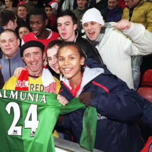 Arsenal fans with Manuel Almunias shirt after the match