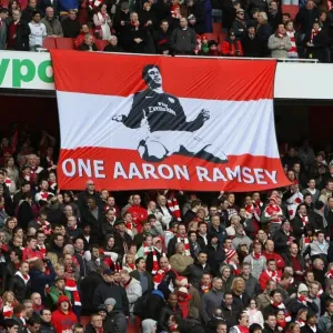 Arsenal Fans Rally Behind Injured Aaron Ramsey: Uniting in Support After His Broken Leg Against Burnley Arsenal Fans Rally Behind Injured Aaron Ramsey: Uniting in Support After His Broken Leg Against Burnley