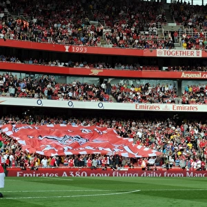 Arsenal fans send the banner round the stand. Arsenal 1: 1 Liverpool. Barclays Premier League