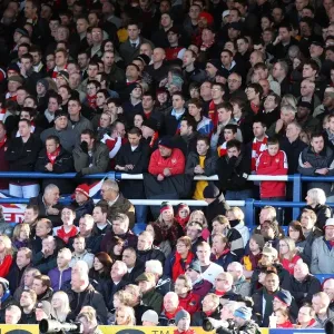 Arsenal fans standing on the terrace Arsenal fans standing on the terrace