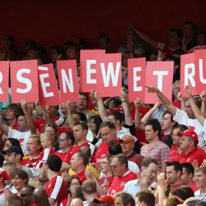 Arsenal fans show their support for the Manager