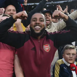 Arsenal Fans Triumphant Euphoria: Celebrating a Hard-Fought Premier League Victory over West Ham United
