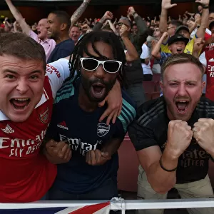 Arsenal Fans Triumphant Roar: Celebrating Victory Over Fulham in the 2022-23 Premier League