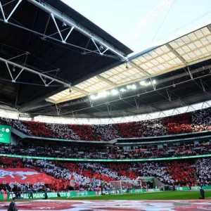 Arsenal Fans Unite: Carabao Cup Final at Wembley - A Sea of Flags Arsenal Fans Unite: Carabao Cup Final at Wembley - A Sea of Flags