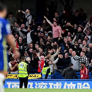 Arsenal Fans Unwavering Passion: A Sea of Red and White at Stamford Bridge during Chelsea vs Arsenal, Premier League 2021-22