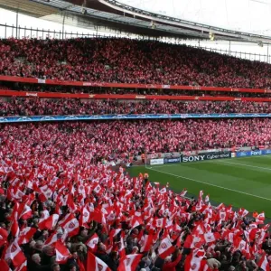 Arsenal Fans Wave Flags Amidst Semi-Final Defeat: Arsenal 1-3 Manchester United, UEFA Champions League, Emirates Stadium, 2009 Arsenal Fans Wave Flags Amidst Semi-Final Defeat: Arsenal 1-3 Manchester United, UEFA Champions League, Emirates Stadium, 2009