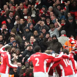 Arsenal Fans Go Wild: Celebrating the 3rd Goal in a 4-2 Victory over Bolton Wanderers (Barclays Premier League, Emirates Stadium, 20/1/10) Arsenal Fans Go Wild: Celebrating the 3rd Goal in a 4-2 Victory over Bolton Wanderers (Barclays Premier League, Emirates Stadium, 20/1/10)