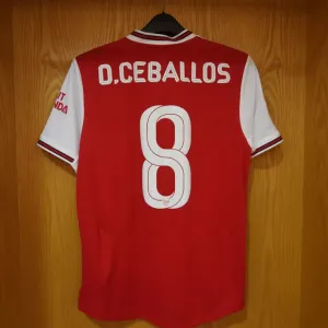 Arsenal FC: Dani Ceballos Hanging Shirt in Emirates Cup Home Changing Room (Arsenal v Olympique Lyonnais, 2019-20) Arsenal FC: Dani Ceballos Hanging Shirt in Emirates Cup Home Changing Room (Arsenal v Olympique Lyonnais, 2019-20)