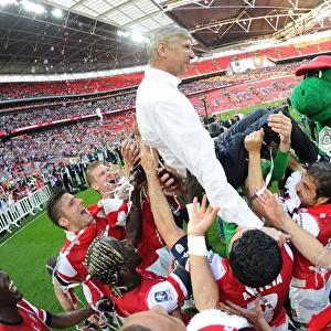 Arsenal FC: FA Cup Victory - Arsene Wenger's Triumphant Lift by the Squad