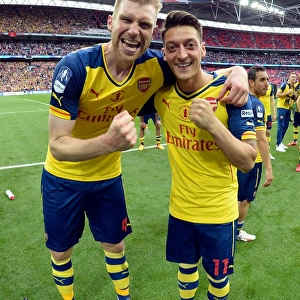 Arsenal FC: Per Mertesacker and Mesut Ozil Celebrate FA Cup Victory