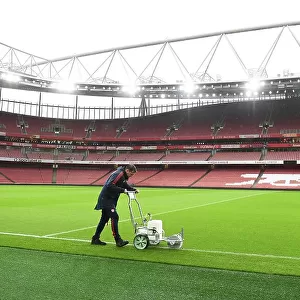 Arsenal FC: Preparing the Emirates Stadium Pitch for Arsenal vs. Nottingham Forest (2022-23)