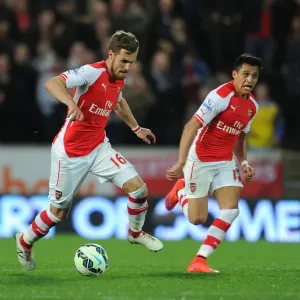 Arsenal FC Print: Aaron Ramsey and Alexis Sanchez in Action