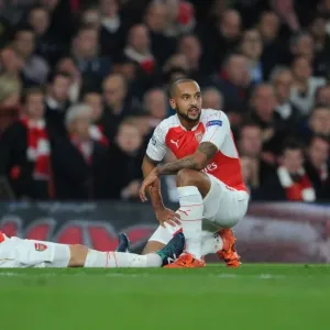Arsenal FC: Theo Walcott Comforts Injured Aaron Ramsey during the Arsenal vs. FC Bayern Munich UCL Clash (2015/16) Arsenal FC: Theo Walcott Comforts Injured Aaron Ramsey during the Arsenal vs. FC Bayern Munich UCL Clash (2015/16)