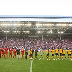 Arsenal and FC Twente line up before the match