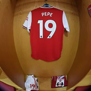 Arsenal FC vs Chelsea FC: Pre-Match Atmosphere - Nicolas Pepe's Jersey in Arsenal Changing Room (Arsenal v Chelsea 2019-20)