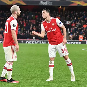 Arsenal FC vs Olympiacos FC: Europa League Clash - Mustafi and Xhaka in Action
