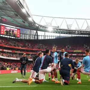 Arsenal FC vs Southampton FC: Premier League Showdown - Arsenal Players Warm Up at Emirates Stadium