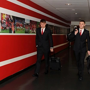 Arsenal Football Club: Ramsey and Vermaelen Approach Emirates Stadium for Champions League Clash Against Olympique de Marseille